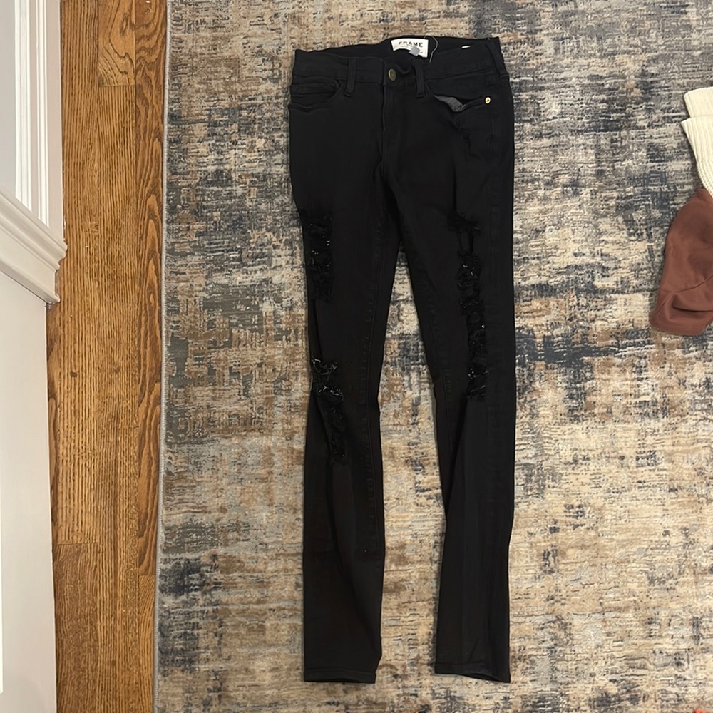 Frame ripped black jeans